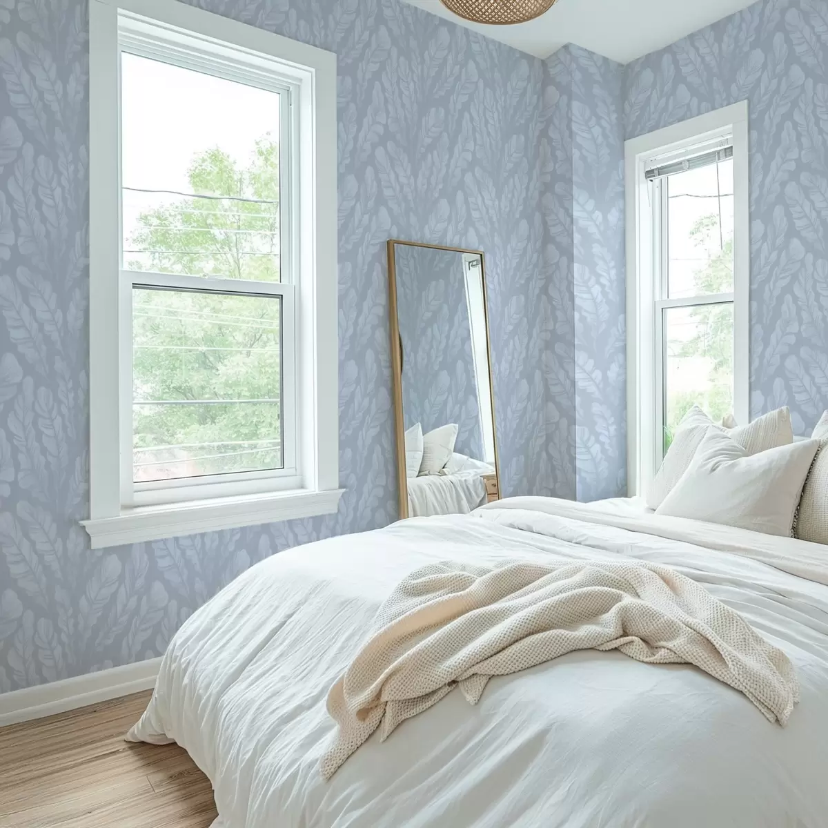 Papel pintado Plumas grandes en tonos azul claro y gris. a00839v1